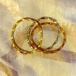 Set of 3 gold tones bracelets